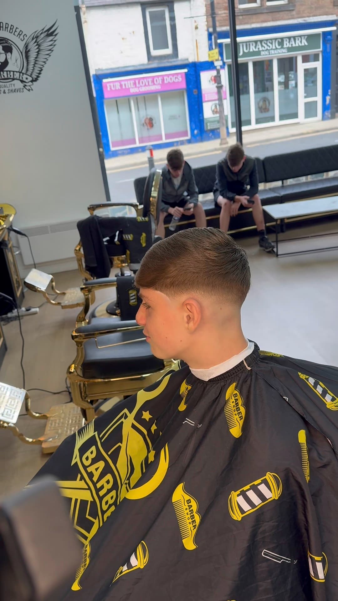 Inside Bonnie Barbers looking out of the front window onto Tranent High Street
